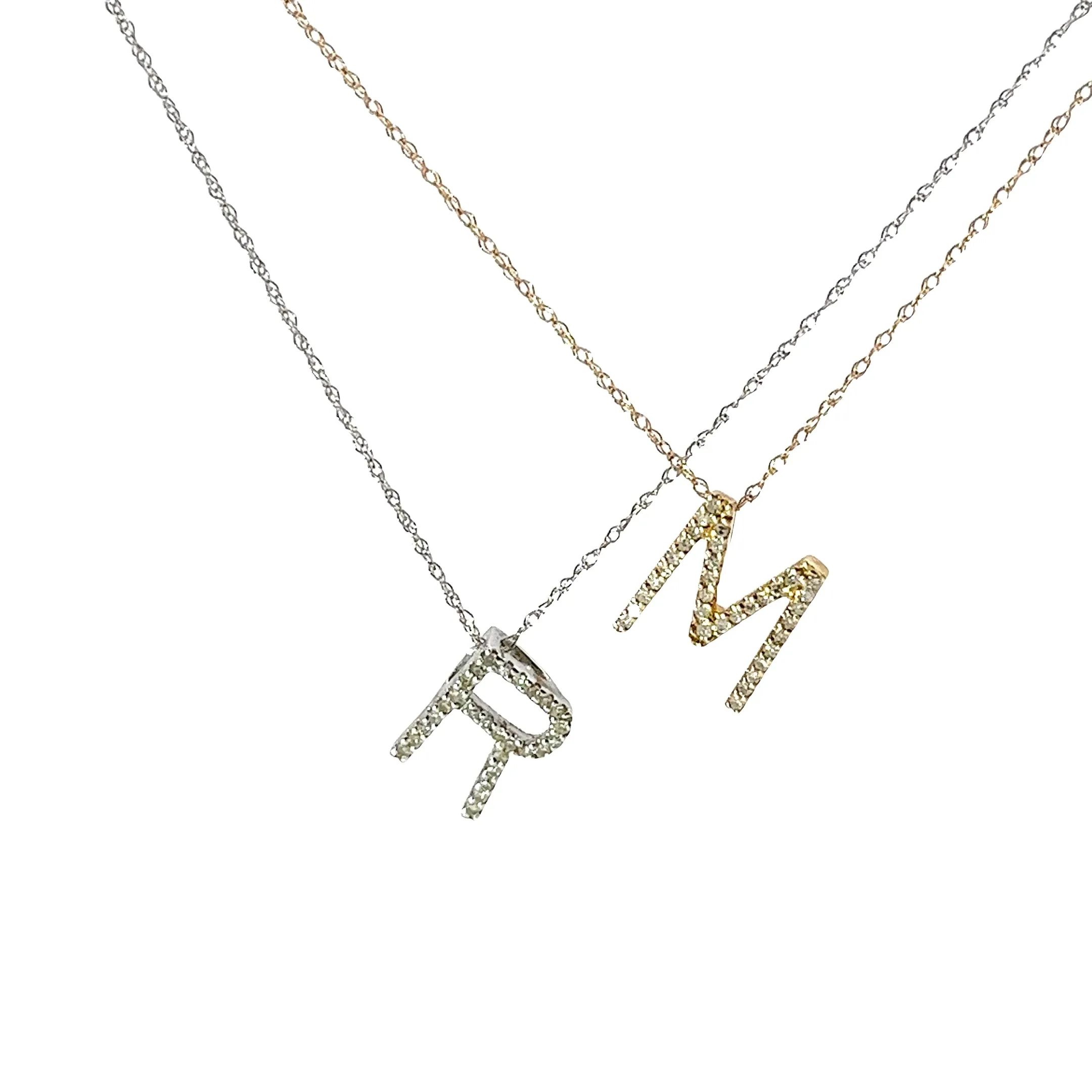 14K WHITE GOLD AND YELLOW GOLD .20CT GSI1 DIAMOND INTIALS