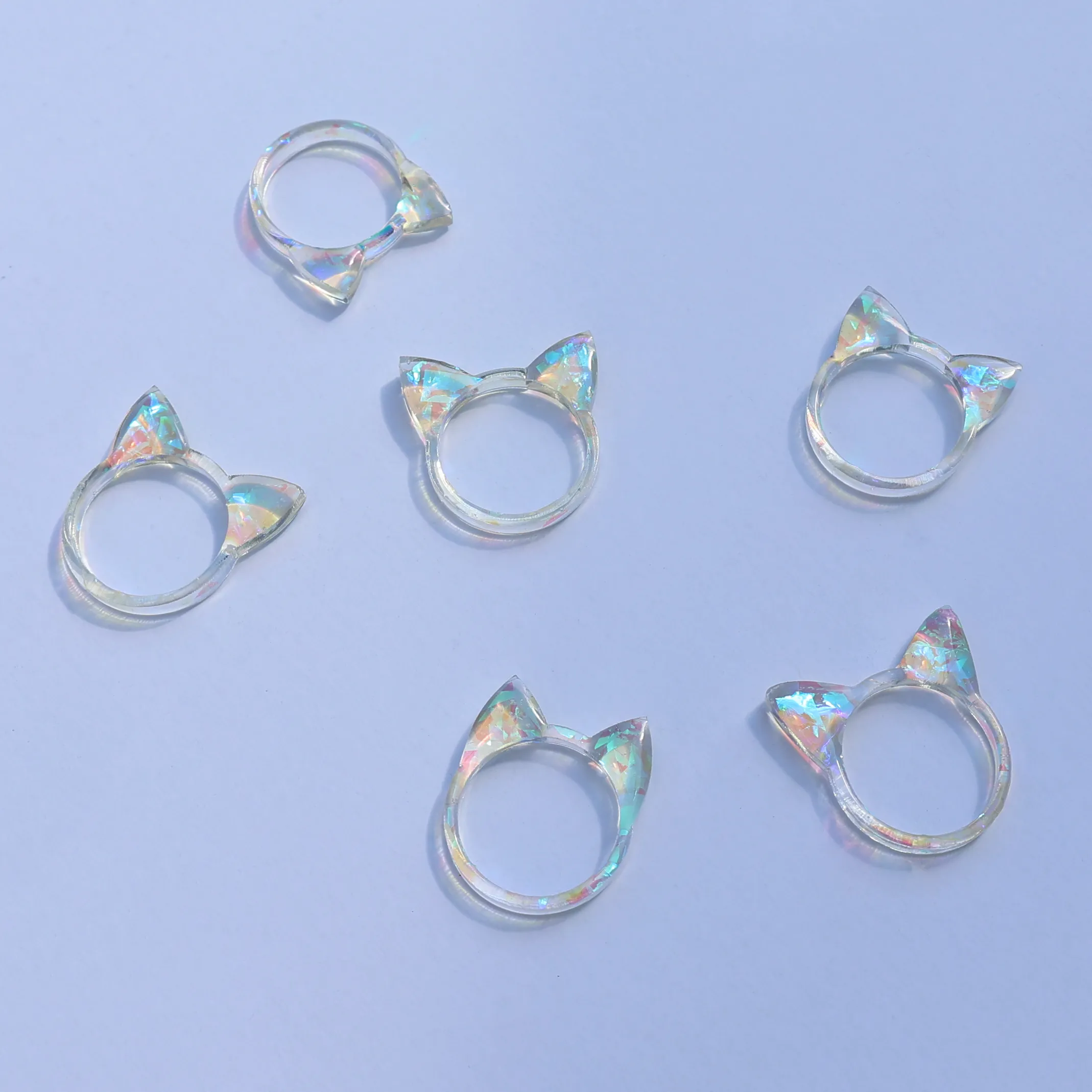 IRIDESCENT ANIMAL EAR RINGS