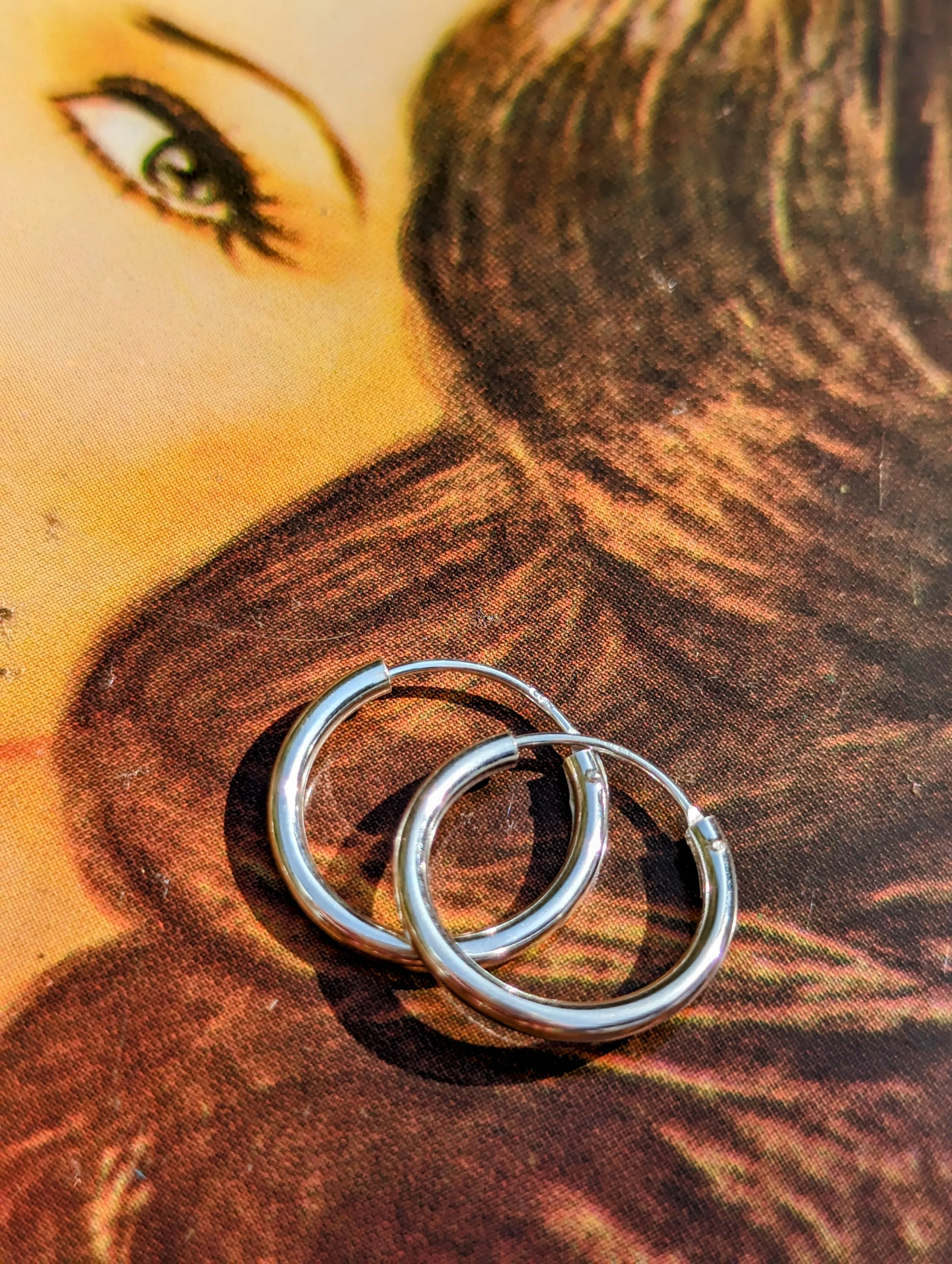 Simple silver hoops