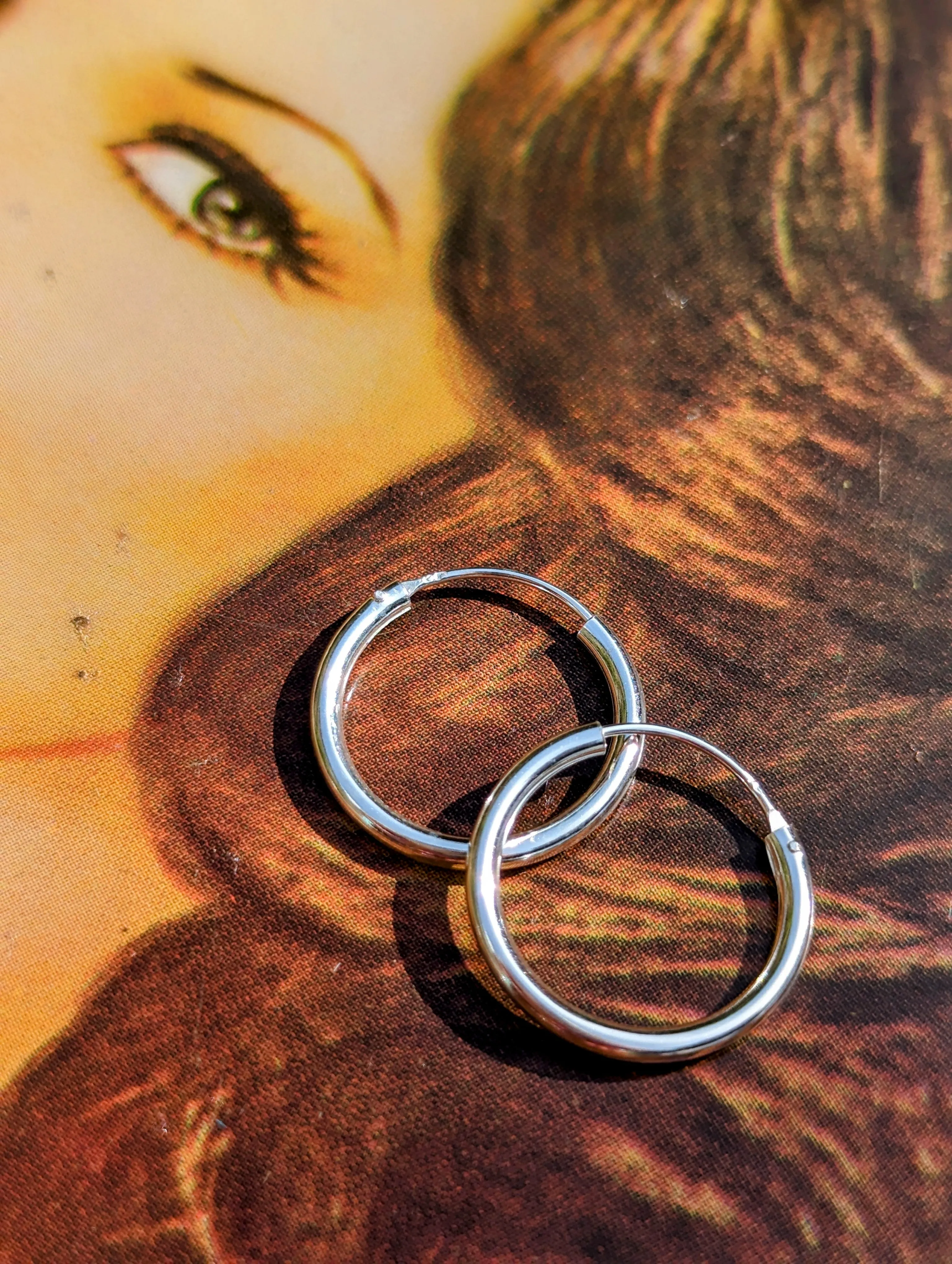 Simple silver hoops