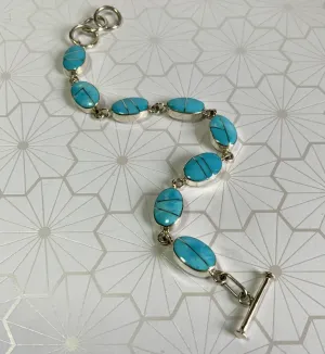 Sweep Me Off My Feet Sleeping Beauty Inlay Bracelet