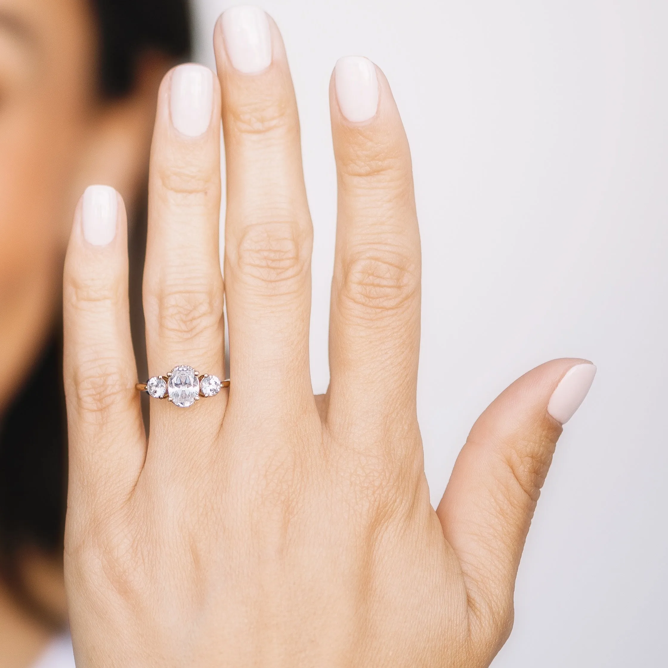 Trio Oval and Round Diamond Engagement Ring