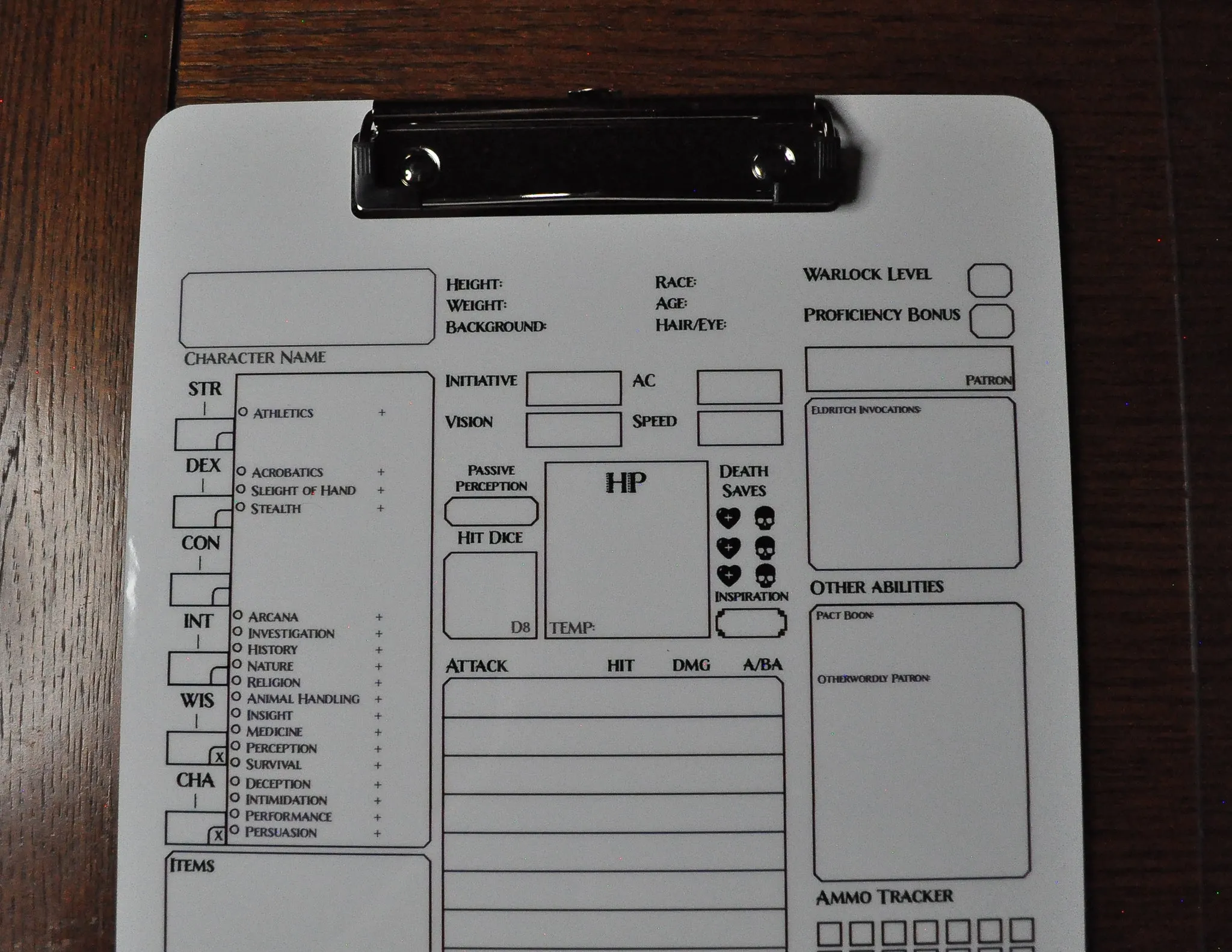 Warlock Character Sheet on a dry erase clipboard